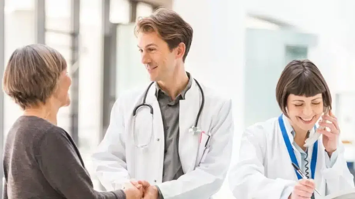 doctors-and-patient-at-reception-desk